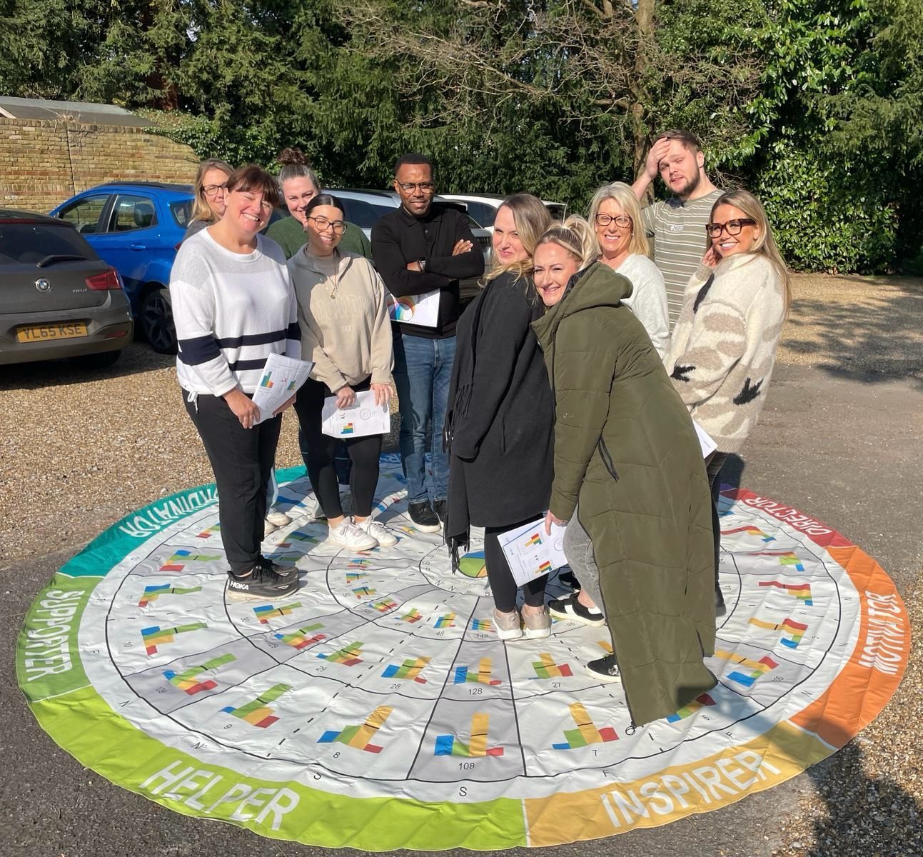 The Signet Resources team poised confidently outside their office, showcasing the diverse professionals behind their successful recruitment services.