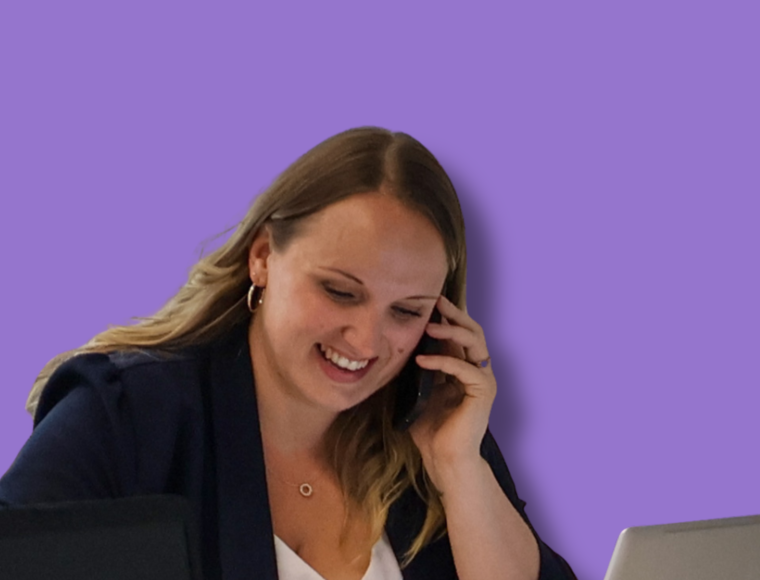Signet Resources recruitment team engaged in a discussion around a table, with a whiteboard outlining key points in the background.
