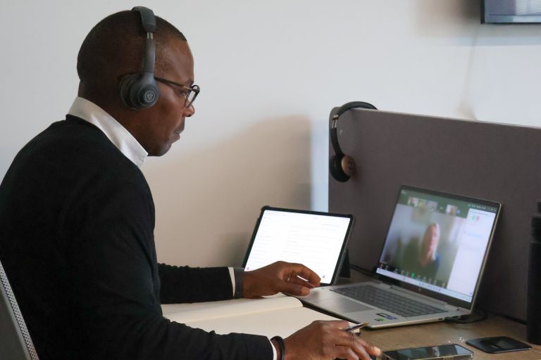 Signet Resources recruitment session with a consultant presenting CV enhancement tips to a colleague.