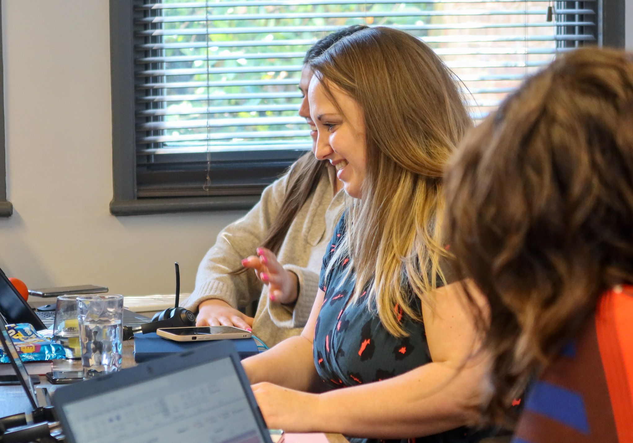 A Signet Resources team member brainstorming recruitment strategies on a whiteboard, fostering a collaborative and innovative work environment.